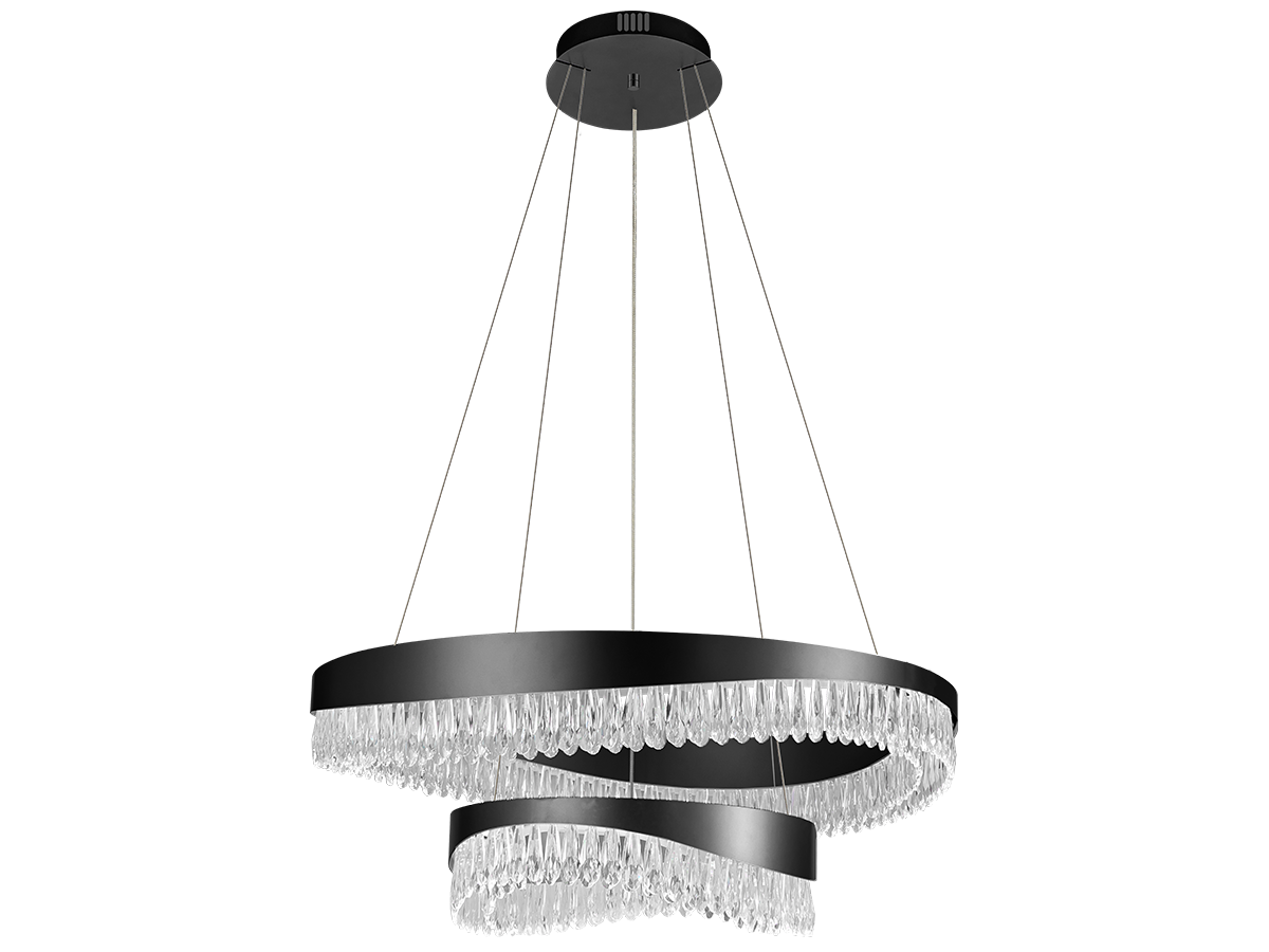 Kontrast tmavého povrchu a krištáľových detailov vytvára výrazný svetelný dojem v modernom interiéri.